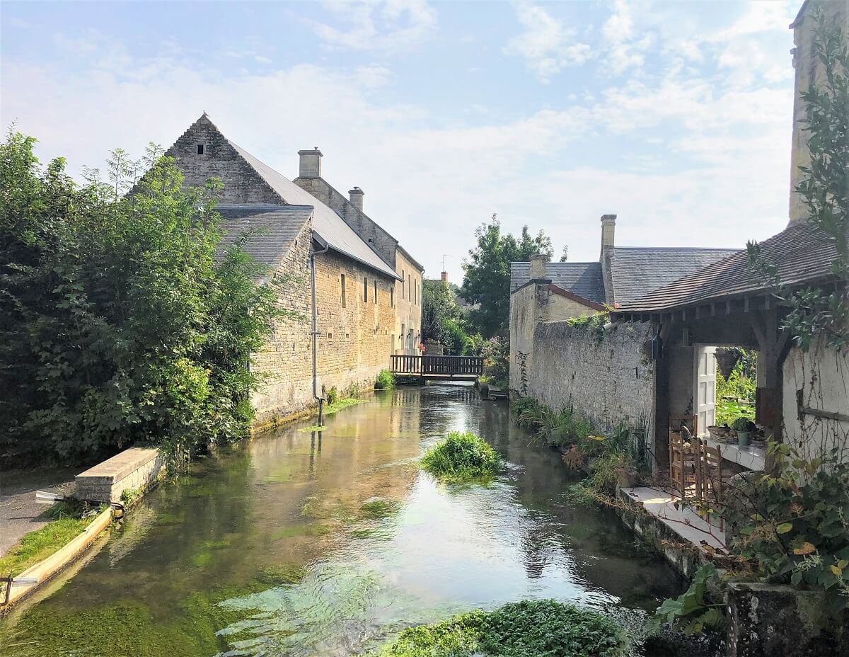 reviers and the river la mue, a charming little village close to the bessin